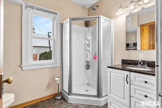 3292 110th St, Stockton, IA 52769 - full bathroom featuring a shower stall and vanity