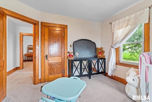 3292 110th St, Stockton, IA 52769 - carpeted bedroom featuring baseboards