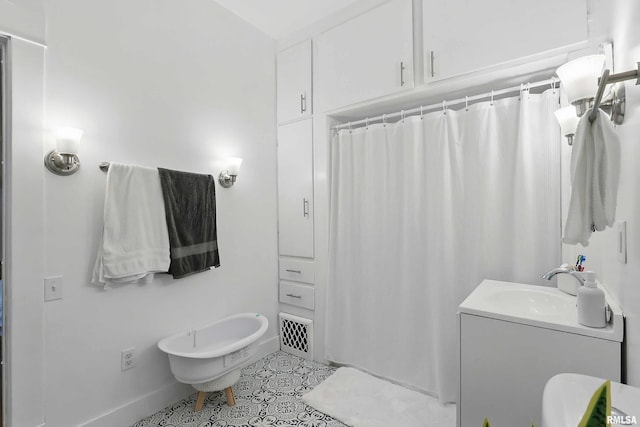 3123 Commodore St, Davenport, IA 52802 - bathroom featuring vanity, tile patterned flooring, and a shower with shower curtain