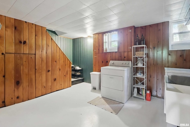 3123 Commodore St, Davenport, IA 52802 - laundry room with washer / clothes dryer, wood walls, and plenty of natural light