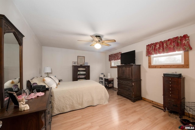204 Bracey St, Marion, IL 62959 - bedroom featuring light wood finished floors and ceiling fan