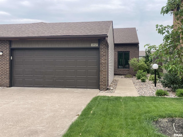1862 53rd St, Moline, IL 61265 - view of front of house featuring brick siding, roof with shingles, an attached garage, and concrete driveway