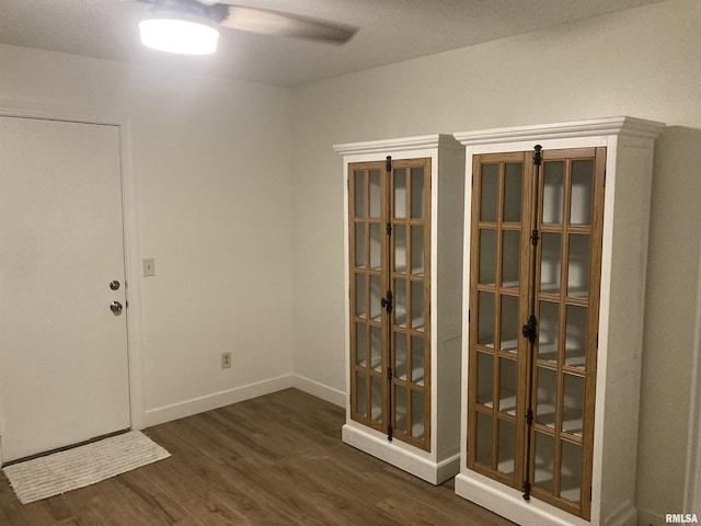 1862 53rd St, Moline, IL 61265 - spare room featuring dark wood-style flooring and ceiling fan