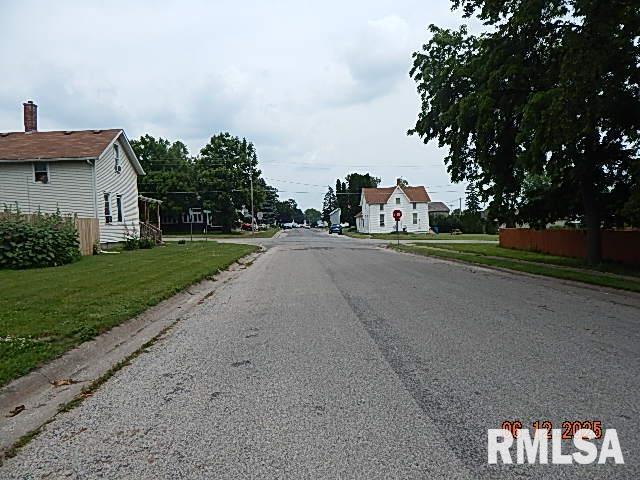 708 3rd St, Buffalo, IA 52728 - view of asphalt road with traffic signs