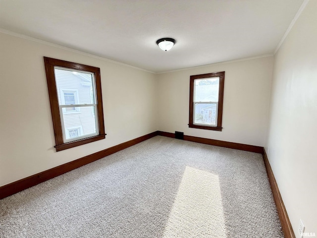 1820 13th St, Rock Island, IL 61201 - carpeted spare room with ornamental molding