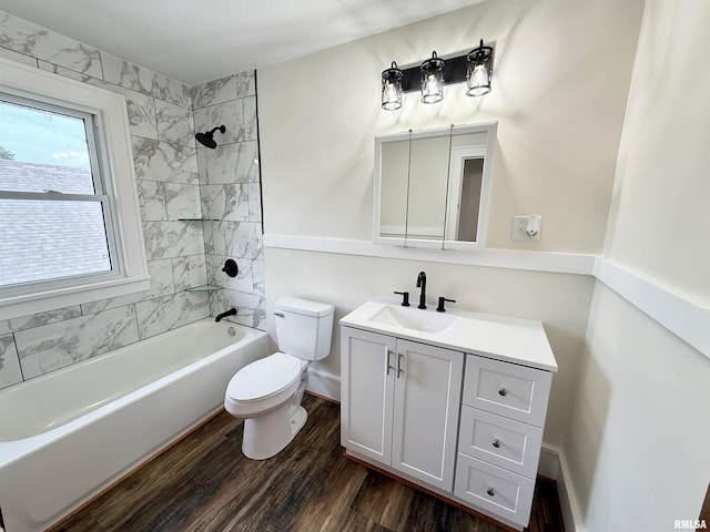 1820 13th St, Rock Island, IL 61201 - full bath featuring vanity, wood finished floors, and bathtub / shower combination