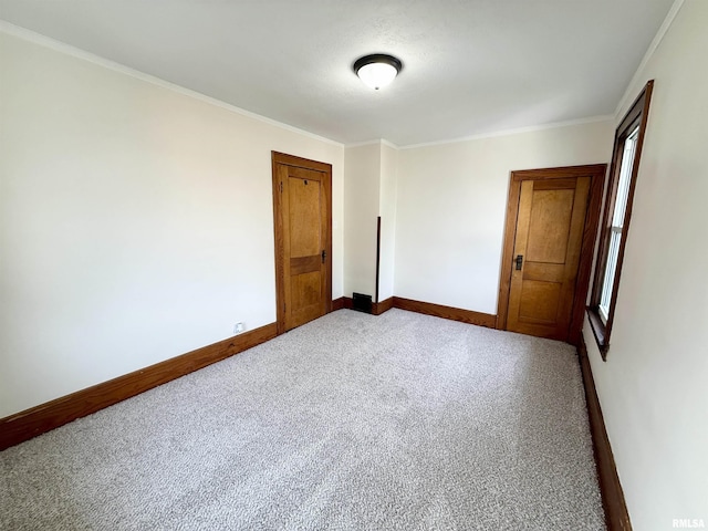 1820 13th St, Rock Island, IL 61201 - spare room with carpet and ornamental molding