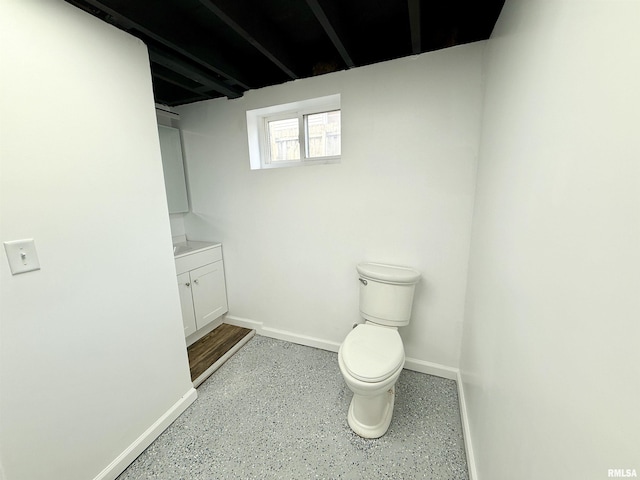 1820 13th St, Rock Island, IL 61201 - bathroom featuring vanity and speckle patterned floor