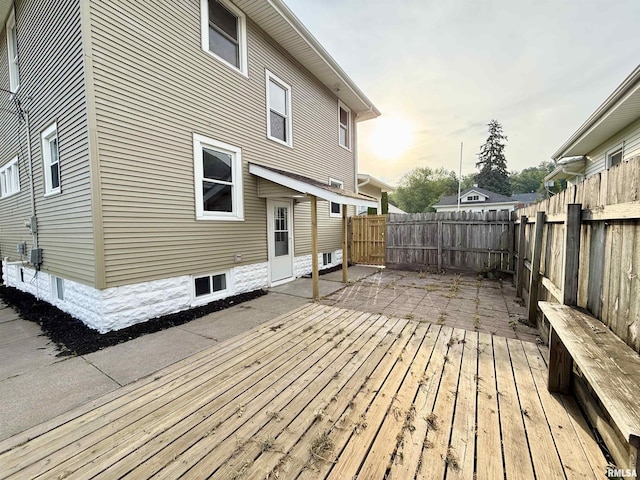 1820 13th St, Rock Island, IL 61201 - wooden terrace featuring a fenced backyard and a patio