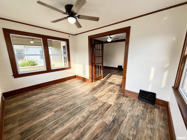 1820 13th St, Rock Island, IL 61201 - unfurnished room with wood finished floors, ceiling fan, and crown molding