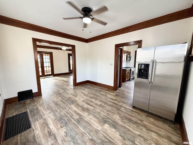 1820 13th St, Rock Island, IL 61201 - kitchen featuring appliances with stainless steel finishes, ceiling fan, wood finished floors, and crown molding