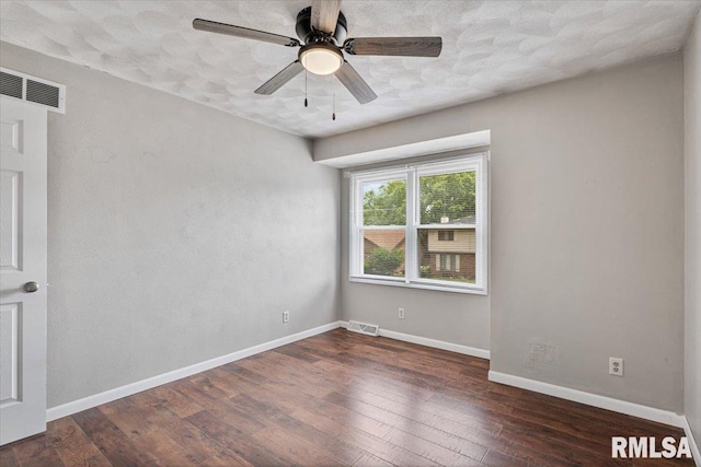 3611 75th St, Moline, IL 61265 - empty room with hardwood / wood-style flooring, ceiling fan, and a textured ceiling