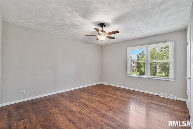 3611 75th St, Moline, IL 61265 - empty room with ceiling fan, wood finished floors, and a textured ceiling