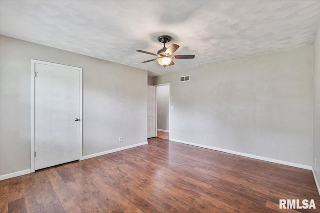3611 75th St, Moline, IL 61265 - spare room featuring a ceiling fan and wood finished floors