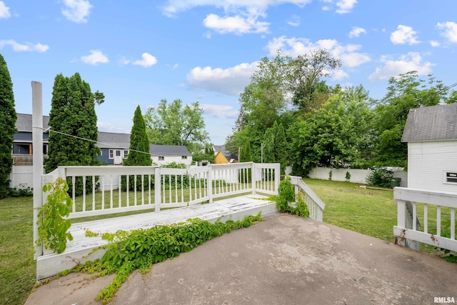 320 16th Ave N, Clinton, IA 52732 - view of patio / terrace featuring a wooden deck and a residential view