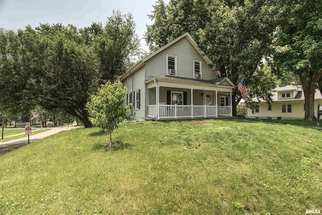 828 10th Ave, Fulton, IL 61252 - view of front of house with a porch and a front lawn