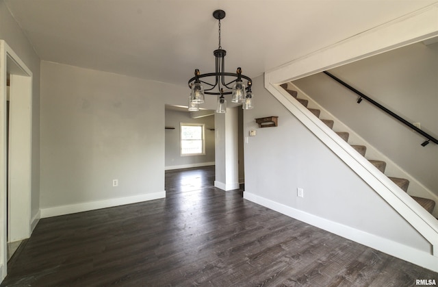 828 10th Ave, Fulton, IL 61252 - unfurnished dining area featuring dark wood-style flooring, stairway, and a chandelier