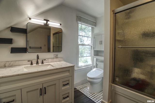 828 10th Ave, Fulton, IL 61252 - bathroom featuring vanity, lofted ceiling, and an enclosed shower