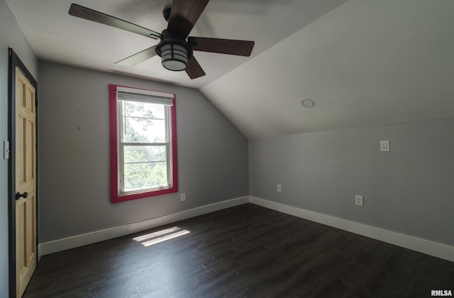 828 10th Ave, Fulton, IL 61252 - bonus room featuring dark wood-style floors, vaulted ceiling, and ceiling fan