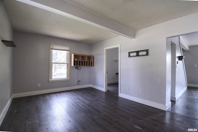 828 10th Ave, Fulton, IL 61252 - unfurnished living room with a textured ceiling, dark wood-type flooring, and beam ceiling