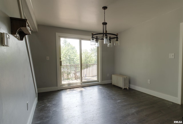828 10th Ave, Fulton, IL 61252 - unfurnished dining area with radiator, a chandelier, and dark wood-style floors