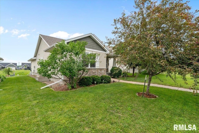 6234 Mississippi Ave, Davenport, IA 52807 - view of front facade with a front lawn and stone siding