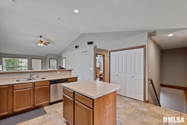 6234 Mississippi Ave, Davenport, IA 52807 - kitchen featuring stainless steel dishwasher, brown cabinetry, lofted ceiling, light countertops, and ceiling fan
