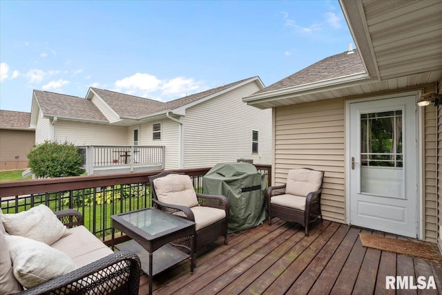 6234 Mississippi Ave, Davenport, IA 52807 - wooden terrace with a grill and an outdoor living space