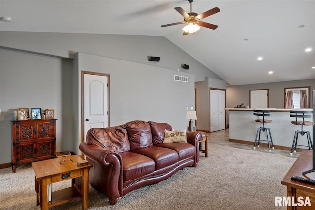6234 Mississippi Ave, Davenport, IA 52807 - living room with lofted ceiling, a ceiling fan, light colored carpet, and recessed lighting