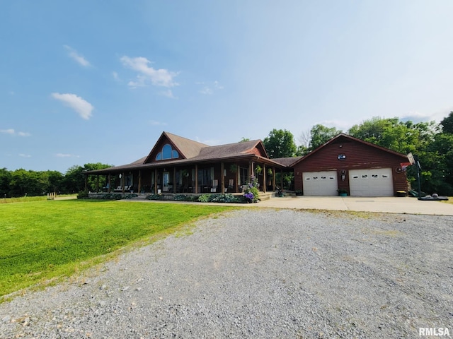313 Double C Farm Ln, Dongola, IL 62964 - country-style home featuring driveway, a front yard, an attached garage, and covered porch