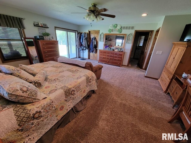 313 Double C Farm Ln, Dongola, IL 62964 - bedroom with carpet flooring, a ceiling fan, and a textured ceiling