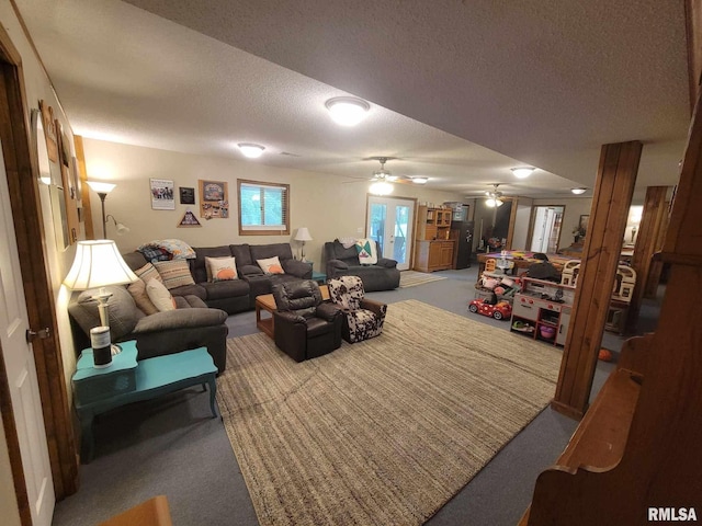 313 Double C Farm Ln, Dongola, IL 62964 - carpeted living area with a textured ceiling and a ceiling fan
