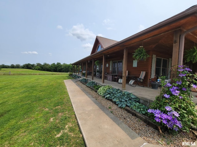 313 Double C Farm Ln, Dongola, IL 62964 - view of grassy yard featuring a patio area