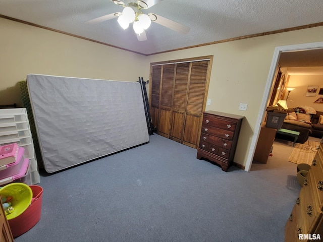 313 Double C Farm Ln, Dongola, IL 62964 - bedroom featuring crown molding, a closet, carpet, and a ceiling fan