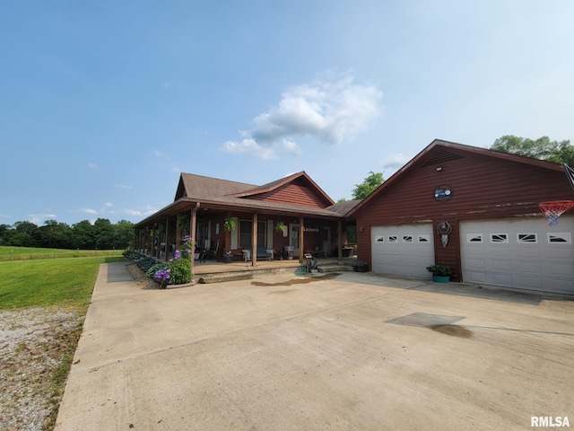 313 Double C Farm Ln, Dongola, IL 62964 - view of front of home featuring driveway, covered porch, and roof with shingles