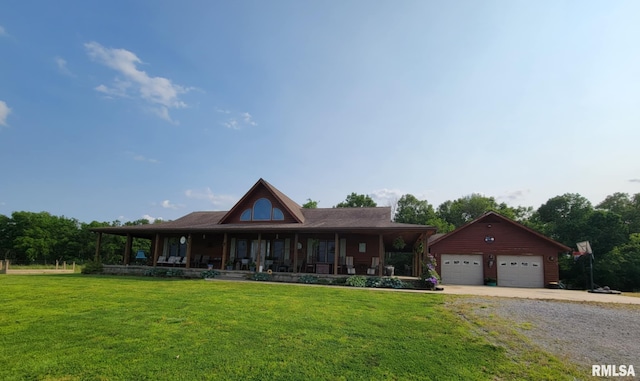313 Double C Farm Ln, Dongola, IL 62964 - view of front of house featuring a front lawn, a garage, a porch, and an outdoor structure