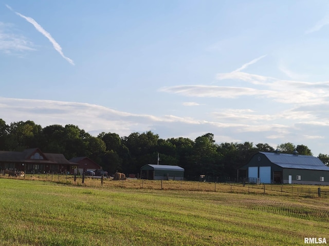 313 Double C Farm Ln, Dongola, IL 62964 - view of yard with an outbuilding, a pole building, a view of countryside, and a detached garage