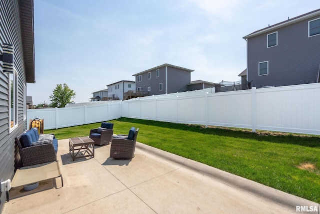 3812 Joyce Ln, Davenport, IA 52806 - fenced backyard with an outdoor living space and a patio area