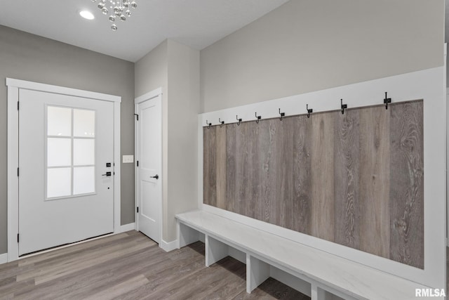 3812 Joyce Ln, Davenport, IA 52806 - mudroom with wood finished floors and a chandelier