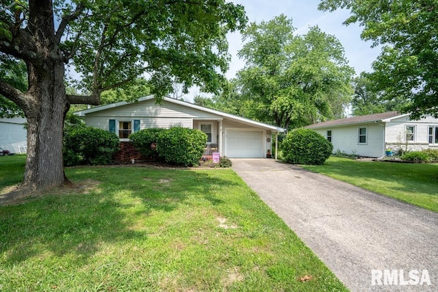 705 S Hadfield St, Marion, IL 62959 - ranch-style home featuring a front yard, an attached garage, and driveway