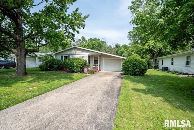 705 S Hadfield St, Marion, IL 62959 - ranch-style home featuring a front yard, an attached garage, and asphalt driveway
