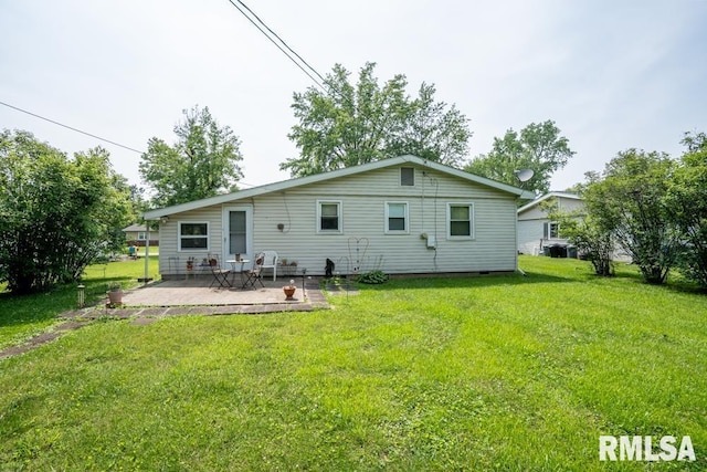 705 S Hadfield St, Marion, IL 62959 - rear view of house with a patio and a yard