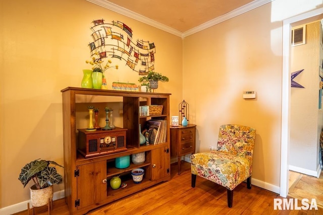705 S Hadfield St, Marion, IL 62959 - living area featuring ornamental molding and wood finished floors