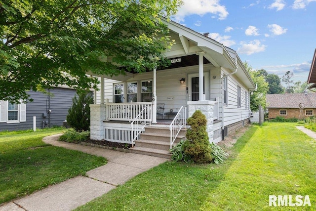 2531 5th St, Moline, IL 61265 - view of front of home featuring covered porch and a front yard