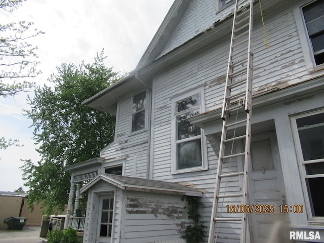 606 Meridian St Unit 1 & 2, Tipton, IA 52772 - view of side of property with a cooling unit