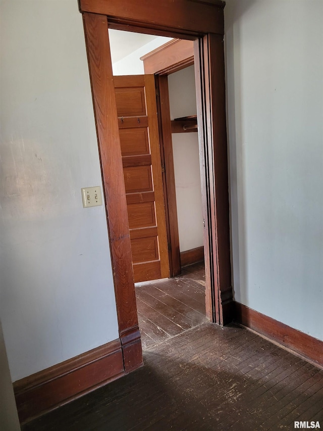 606 Meridian St Unit 1 & 2, Tipton, IA 52772 - hallway with hardwood / wood-style floors and baseboards