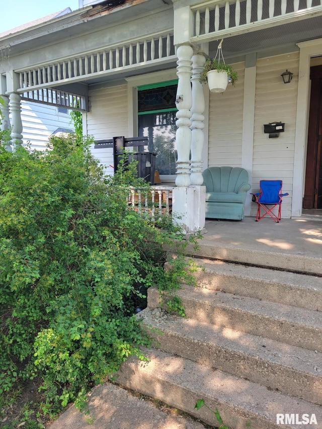 606 Meridian St Unit 1 & 2, Tipton, IA 52772 - entrance to property with a porch