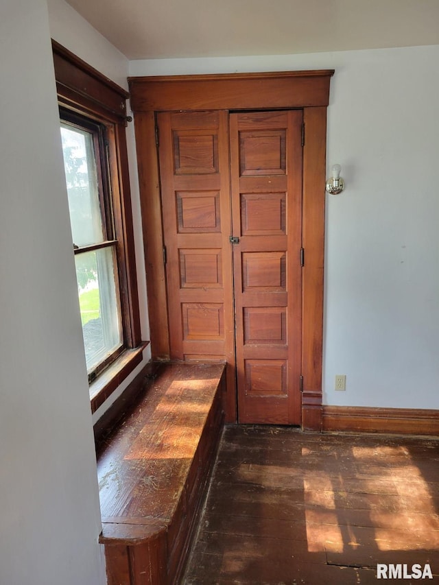606 Meridian St Unit 1 & 2, Tipton, IA 52772 - detailed view of wood finished floors and baseboards