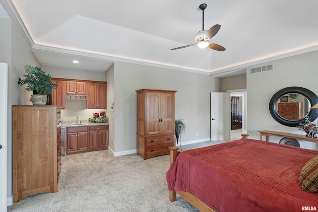 11 Sandstone Ct, Le Claire, IA 52753 - bedroom featuring light colored carpet, ensuite bath, ceiling fan, recessed lighting, and a raised ceiling