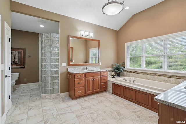 11 Sandstone Ct, Le Claire, IA 52753 - bathroom with vaulted ceiling, vanity, a bath, marble look tiles, and recessed lighting